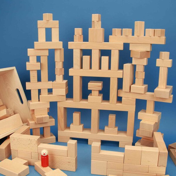 Set uit 140 houten blokken in een beukenhouten kist