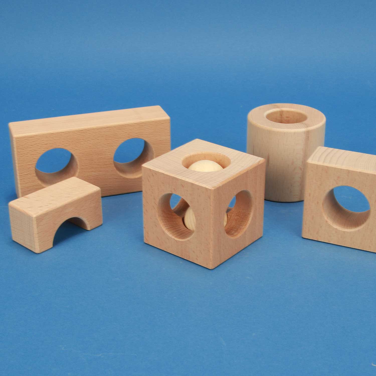 Leren met geboorde houten blokken